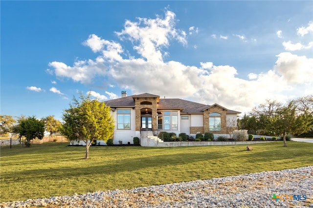 view of front facade with a front yard