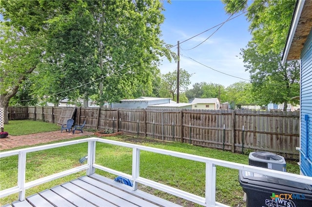 1200 4th St, Palacios, TX 77465 - view of yard with a wooden deck and central AC