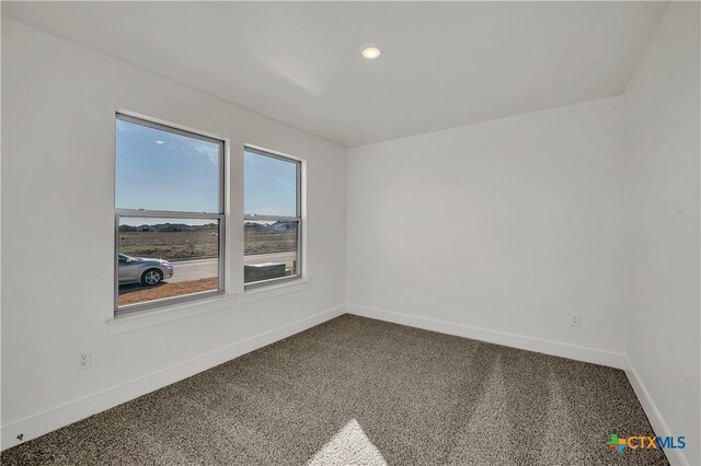 2310 Healy Dr, Temple, TX 76502 - spare room featuring baseboards, dark colored carpet, and recessed lighting