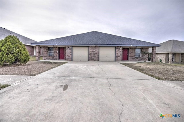 ranch-style home with a garage