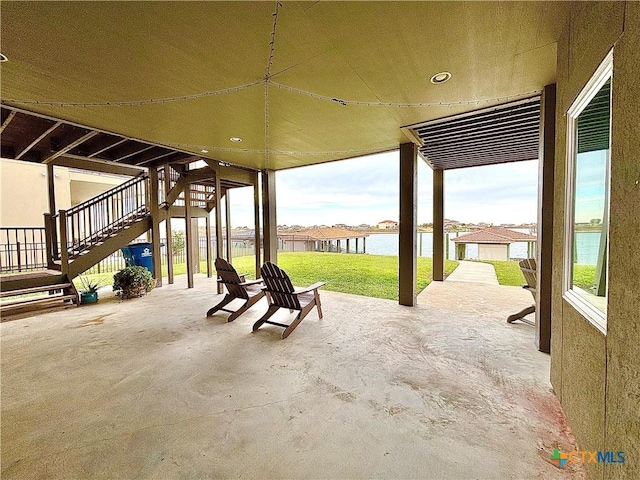 view of patio / terrace with a water view