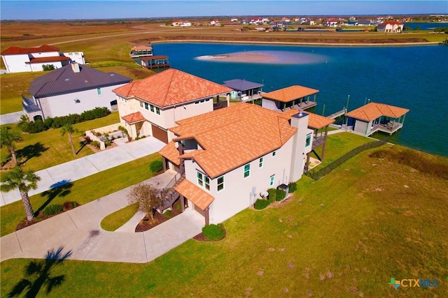 drone / aerial view with a water view