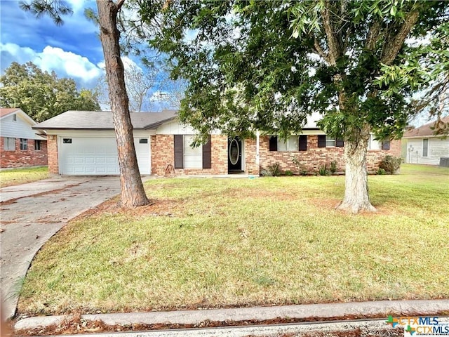 ranch-style home with a garage, driveway, brick siding, and a front lawn