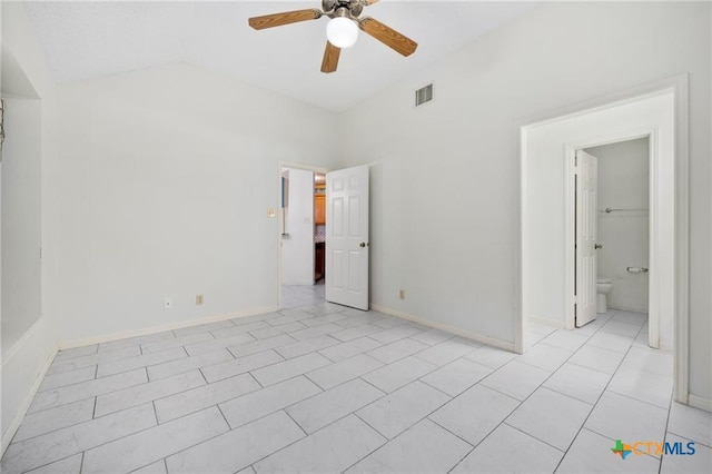 2991 Lakeview E Dr, Ingleside, TX 78362 - unfurnished bedroom with vaulted ceiling, light tile patterned floors, baseboards, and ceiling fan