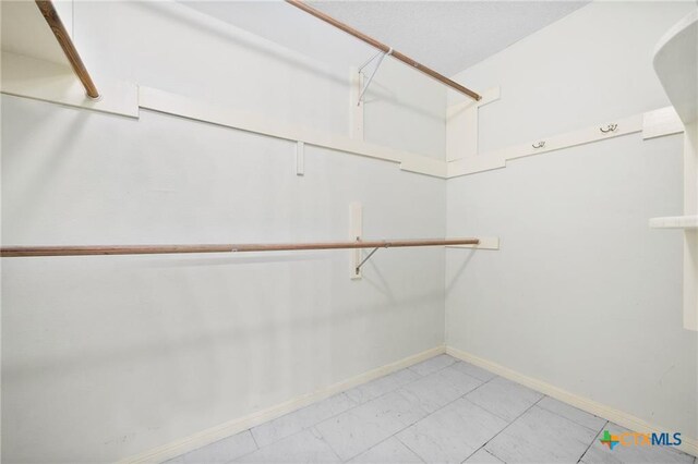 2991 Lakeview E Dr, Ingleside, TX 78362 - spacious closet with marble finish flooring