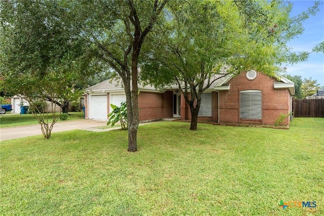 2991 Lakeview E Dr, Ingleside, TX 78362 - ranch-style home with concrete driveway, an attached garage, and brick siding