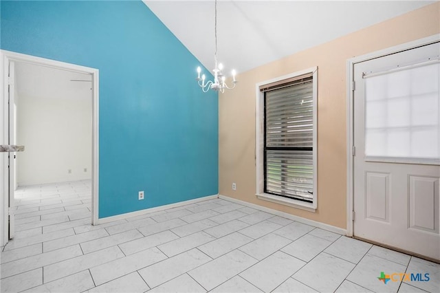2991 Lakeview E Dr, Ingleside, TX 78362 - unfurnished dining area featuring lofted ceiling, a chandelier, and baseboards