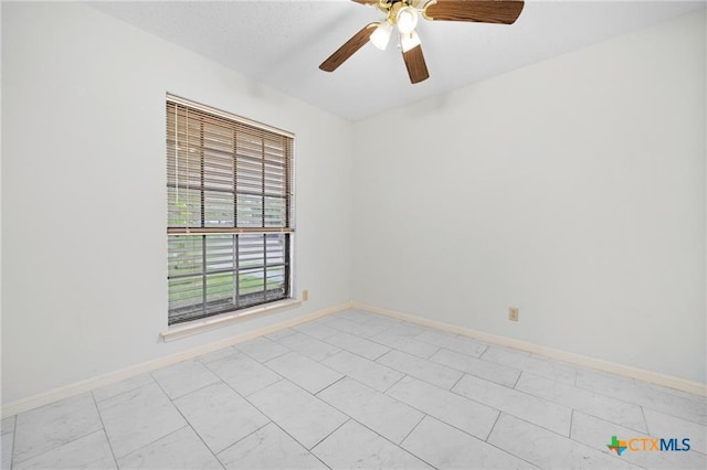 2991 Lakeview E Dr, Ingleside, TX 78362 - spare room with ceiling fan and baseboards