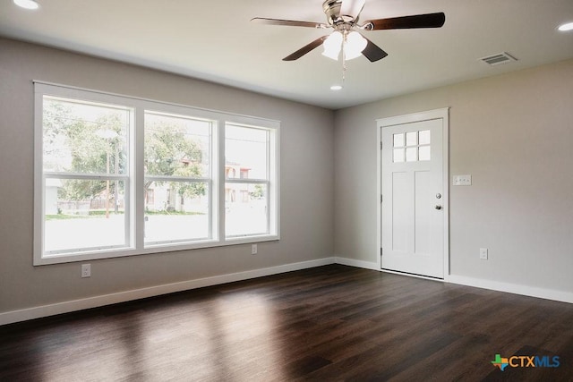 801 E Morgan Ave, Cuero, TX 77954 - entrance foyer featuring dark wood finished floors, baseboards, ceiling fan, and recessed lighting