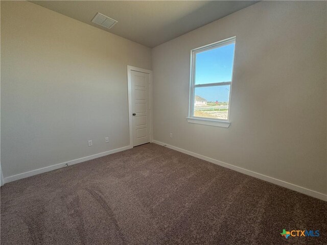 full bathroom featuring baseboards and a garden tub