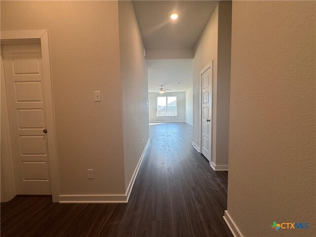 unfurnished room featuring visible vents, baseboards, and carpet