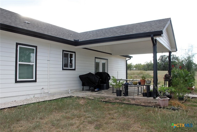 view of home's exterior featuring a patio area