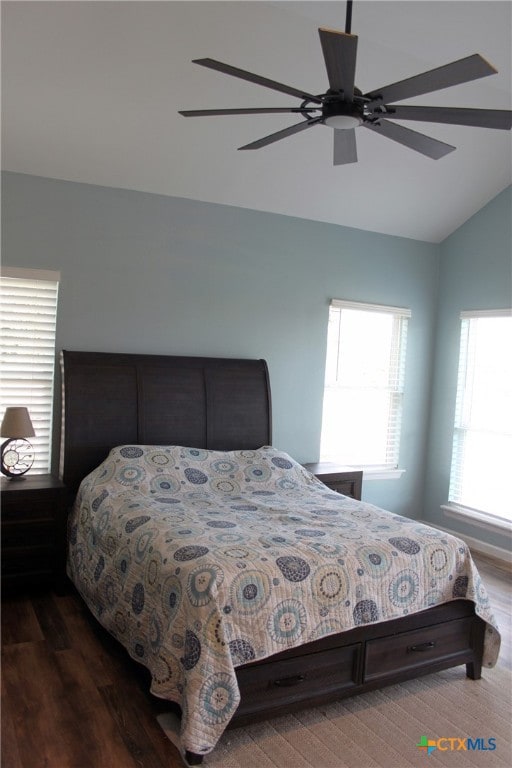 bedroom featuring vaulted ceiling, hardwood / wood-style flooring, and ceiling fan