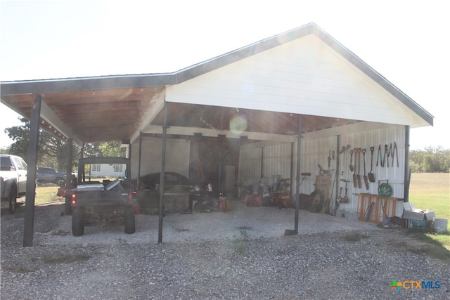 exterior space featuring a carport