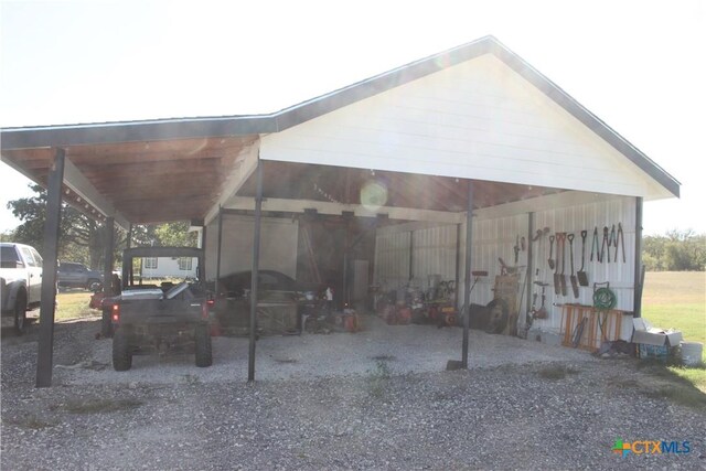 2805 Tumbleweed Trl, Dale, TX 78616 - rear view of property featuring a carport