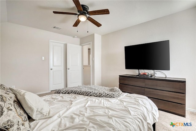 carpeted bedroom with ceiling fan