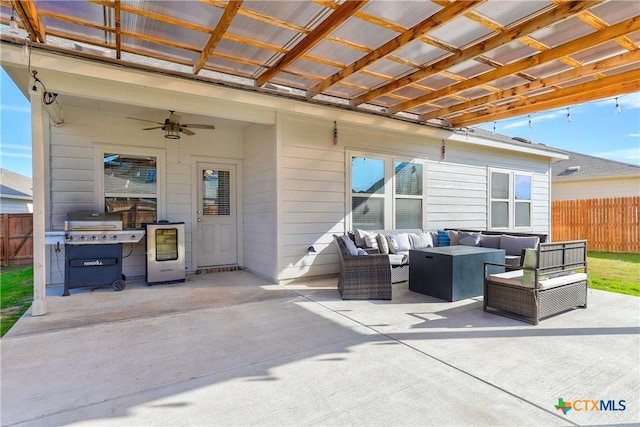 view of patio with a grill, a pergola, outdoor lounge area, and ceiling fan