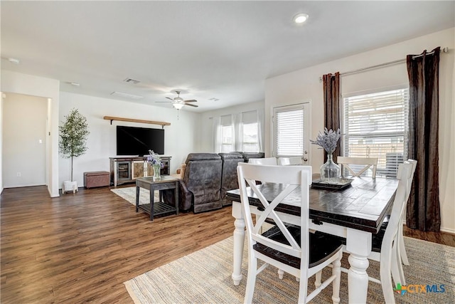 dining room featuring a wealth of natural light, hardwood / wood-style floors, and ceiling fan