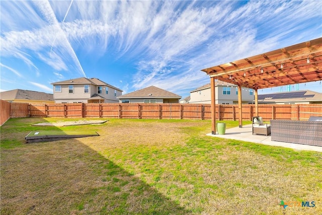 view of yard featuring an outdoor living space and a patio area