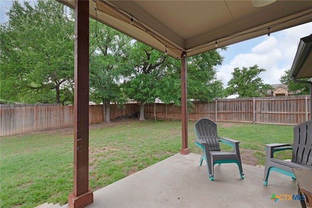 view of patio with a fenced backyard