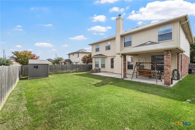 125 Big Timber Dr, Temple, TX 76502 - back of house featuring a patio, a fenced backyard, a storage shed, and a chimney