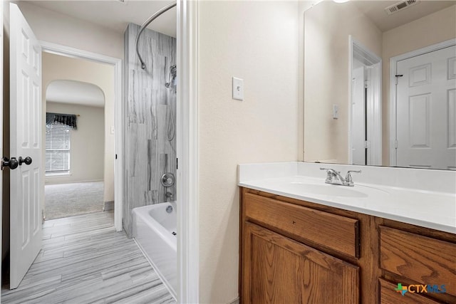 125 Big Timber Dr, Temple, TX 76502 - bathroom with vanity, shower / washtub combination, and wood finished floors