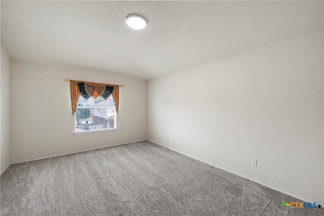 125 Big Timber Dr, Temple, TX 76502 - spare room featuring carpet and baseboards