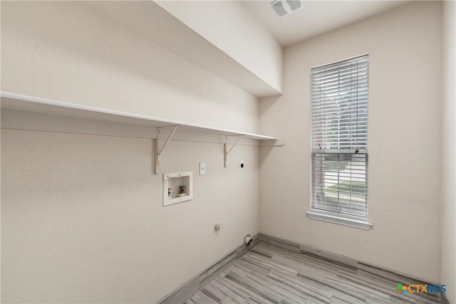 125 Big Timber Dr, Temple, TX 76502 - laundry room with gas dryer hookup, electric dryer hookup, healthy amount of natural light, and hookup for a washing machine