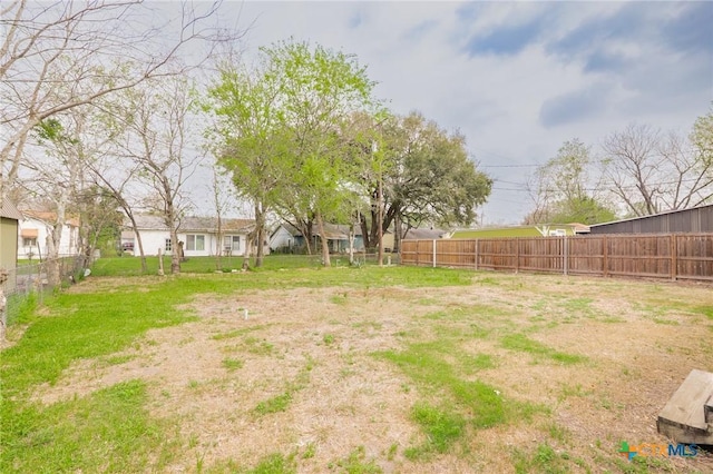 view of yard with fence