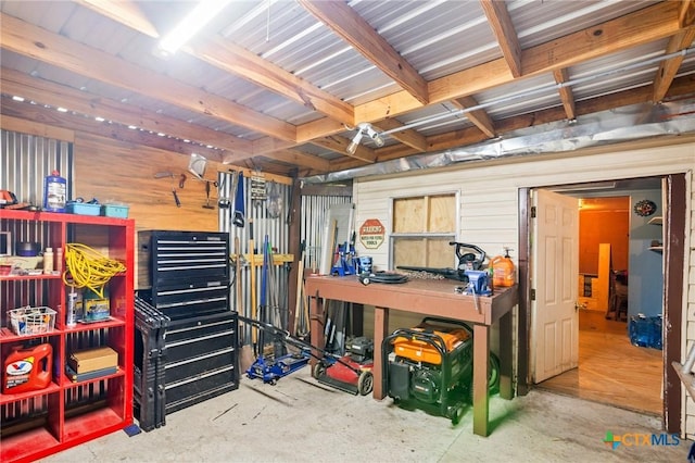 garage with a workshop area