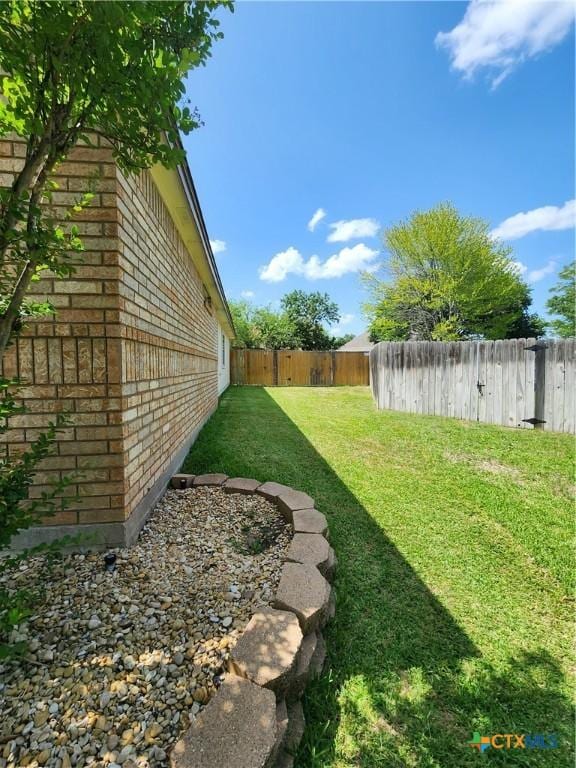 view of fenced backyard