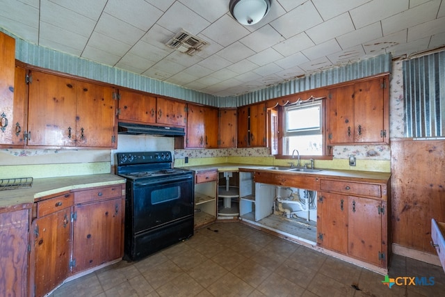 kitchen featuring electric range and sink