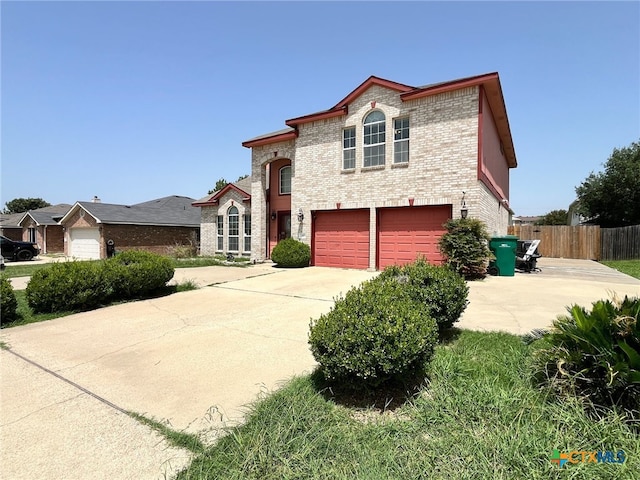 view of front of property with a garage