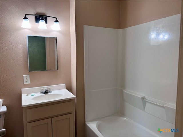 2303 Bon Aire Ave, Victoria, TX 77901 - bathroom with vanity and bathing tub / shower combination