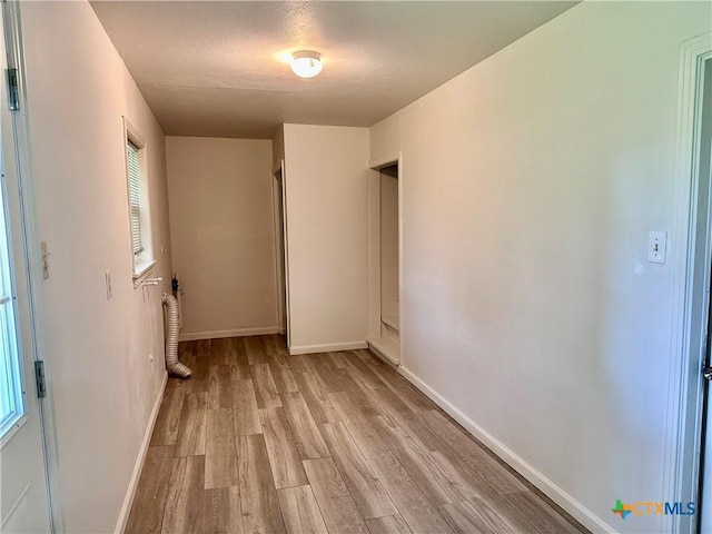 2303 Bon Aire Ave, Victoria, TX 77901 - unfurnished bedroom featuring light wood-style flooring and baseboards