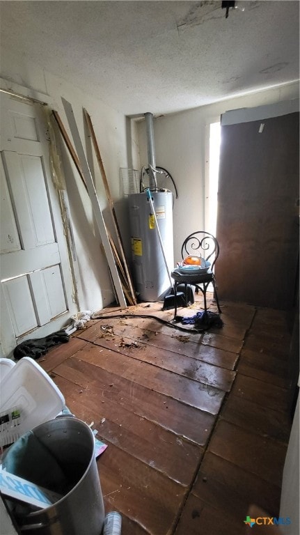 utility room featuring electric water heater