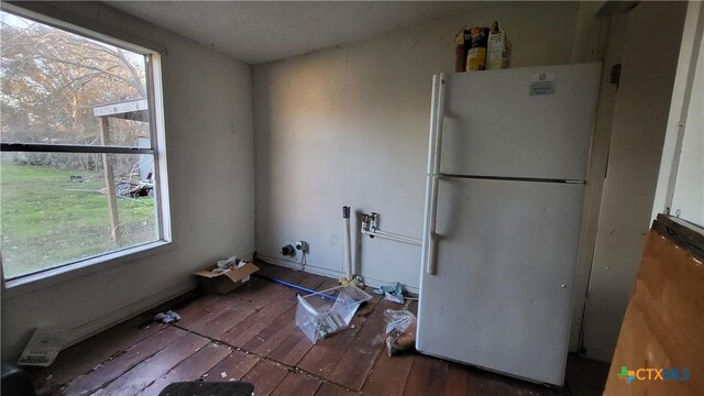 washroom with hardwood / wood-style flooring