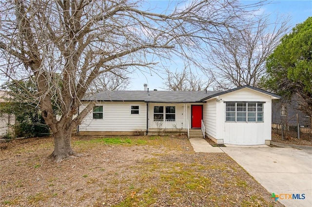 single story home featuring board and batten siding