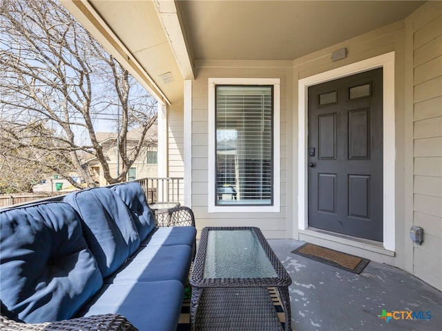 property entrance featuring an outdoor hangout area