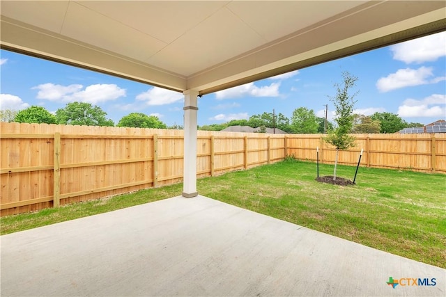 view of patio with a fenced backyard