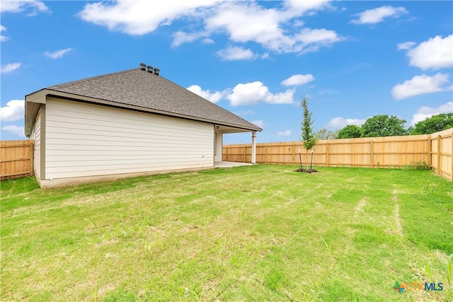 view of yard featuring a fenced backyard