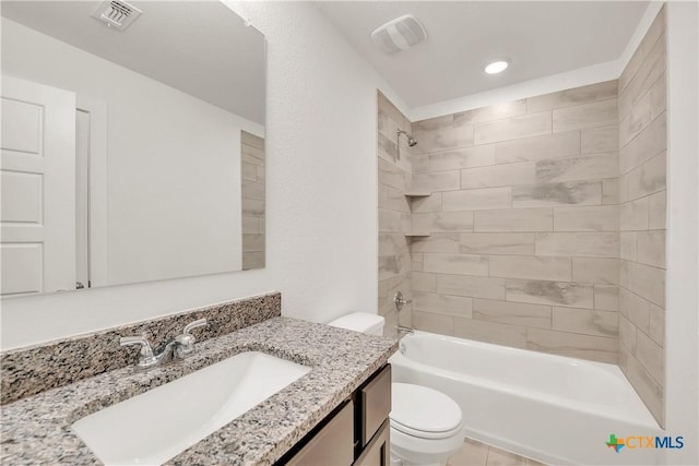 full bathroom with shower / washtub combination, toilet, vanity, and visible vents