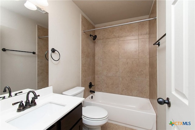 full bathroom with vanity, bathing tub / shower combination, and toilet