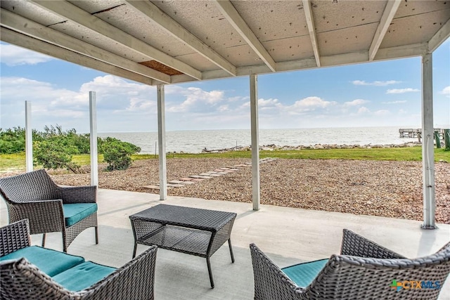 1707 N Ocean Dr, Port Lavaca, TX 77979 - view of patio featuring a water view