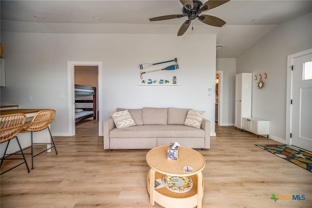 1707 N Ocean Dr, Port Lavaca, TX 77979 - living room featuring light wood-style floors, ceiling fan, lofted ceiling, and baseboards