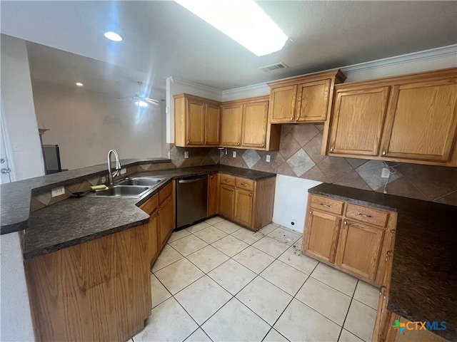 kitchen featuring ornamental molding, sink, dishwasher, kitchen peninsula, and ceiling fan