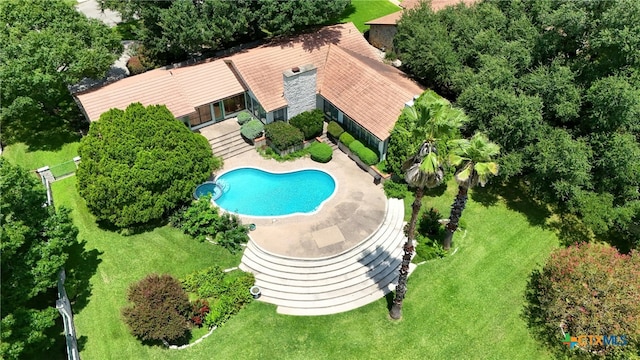 210 Oak Creek Cir, Luling, TX 78648 - aerial view of property and surrounding area featuring a pool area