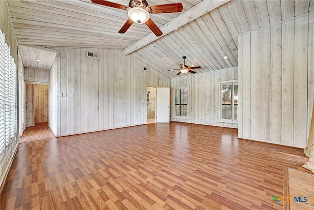 210 Oak Creek Cir, Luling, TX 78648 - unfurnished living room with a ceiling fan, wood finished floors, wood ceiling, and wooden walls
