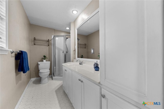 3610 Sierra Blanca Blvd, Temple, TX 76502 - full bath with vanity, a stall shower, baseboards, recessed lighting, and toilet