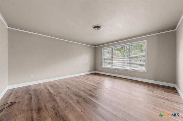 3610 Sierra Blanca Blvd, Temple, TX 76502 - unfurnished room featuring ornamental molding, baseboards, and wood finished floors